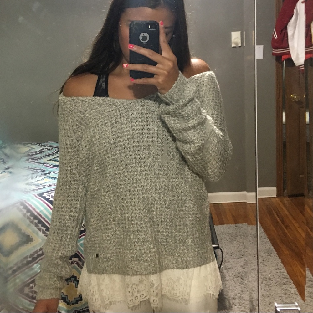 Grey sweater.